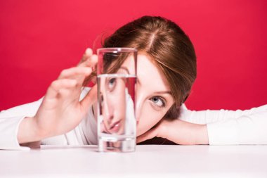 young woman with glass of water clipart