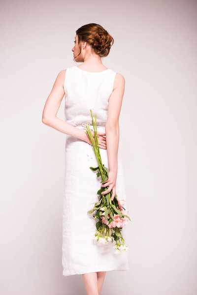 girl in white dress with flowers