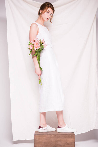 beautiful woman with lily flowers