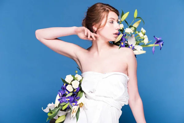 Seductive young woman with flowers — Stock Photo, Image