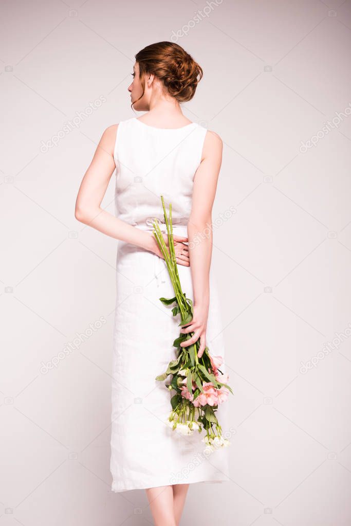 girl in white dress with flowers