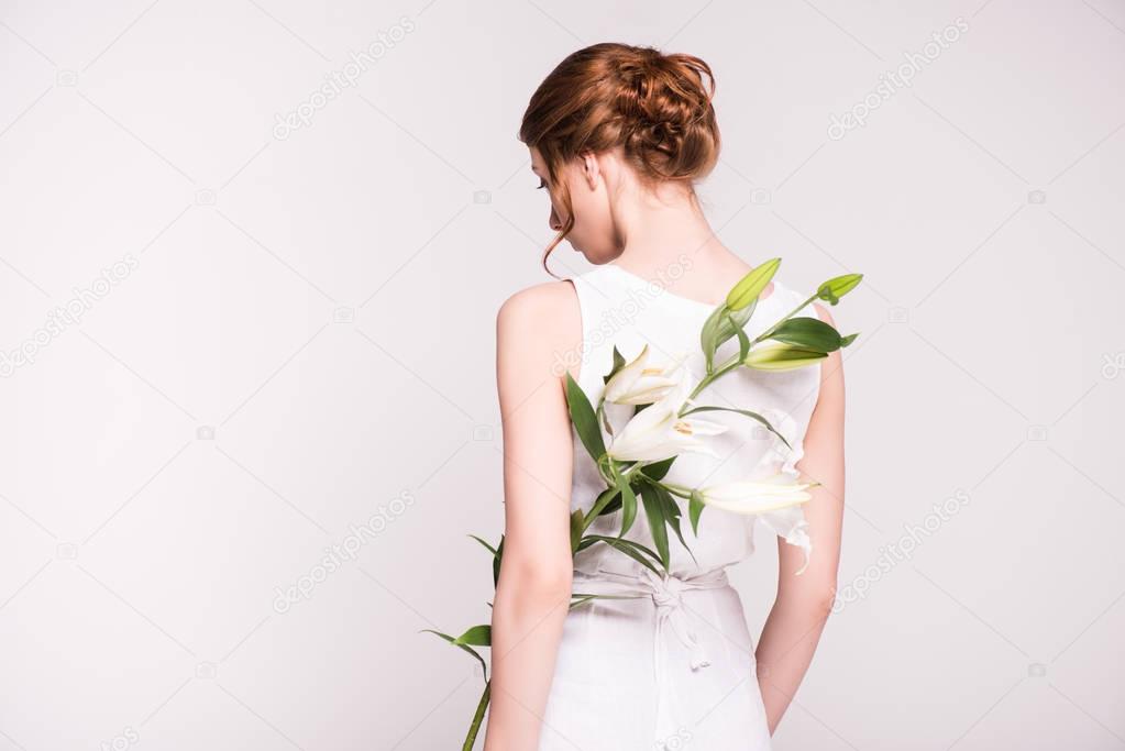 beautiful woman with lily flowers