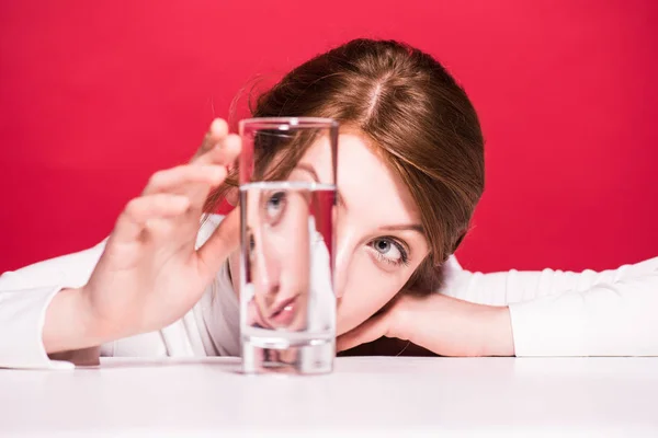 Young woman with glass of water — Stock Photo