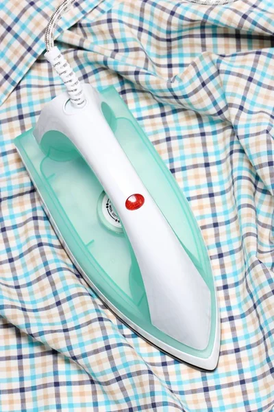 Top View Dry Iron On Cloth Background — Stock Photo, Image