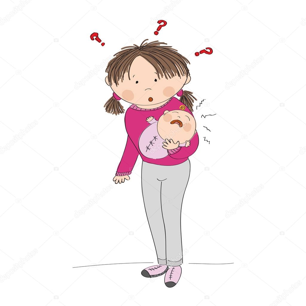 Puzzled young mother holding her crying baby girl. What to do? 