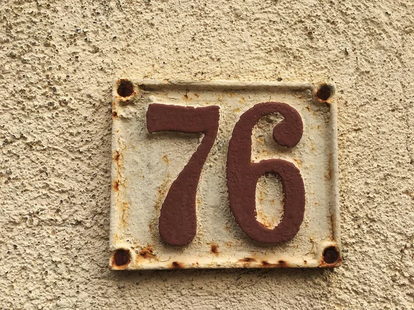 Vintage grunge square metal rusty plate of number — Stock Photo, Image