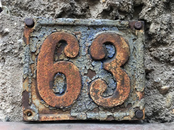 Vintage grunge square metal rusty plate of number — Stock Photo, Image