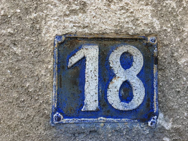 Vintage grunge square metal rusty plate of number — Stock Photo, Image