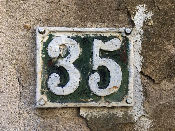 Vintage grunge square metal rusty plate of number — Stock Photo, Image