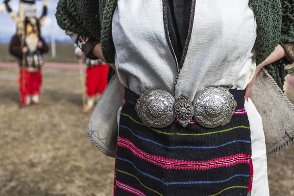 Traditional Bulgarian silver belt buckle on ladies costume.