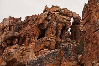Interesting sandstone rock formations in the Cederberg range were formed by wind erosion. clipart