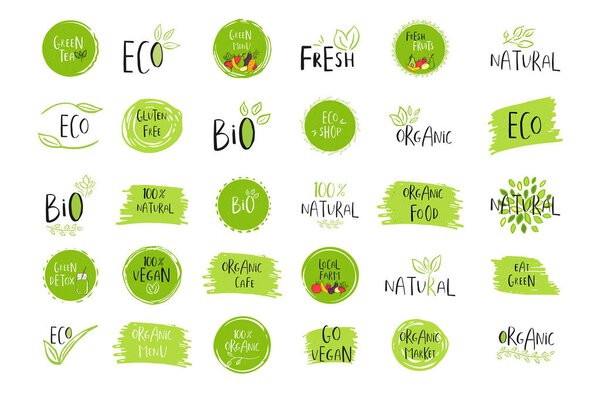 Collection of vector eco, bio green logotypes or signs. Vegan, raw, healthy food badges, tags for cafe, restaurants, products packaging. Hand drawn leaves, branches with lettering. Organic design.
