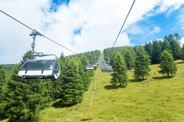 Cable car in the mountains in the summer for hiking