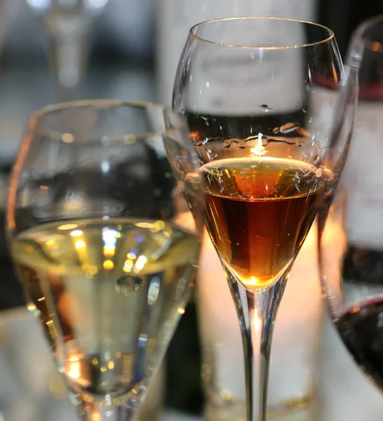 Glass of white wine, cognac and red wine — Stock Photo, Image