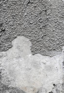Arka planda gri çimento dokusu ile kaplı çatlak beton duvar tasarımda kullanılabilir. Çatlak ve delikli kirli beton doku..