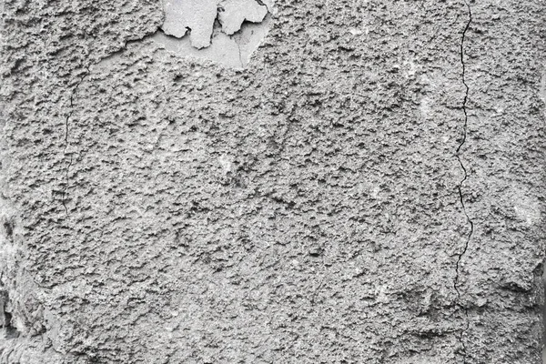 Gebarsten betonnen grijze muur bedekt met grijze cement textuur als achtergrond kan worden gebruikt in het ontwerp. Vuile betonnen textuur met scheuren en gaten. — Stockfoto
