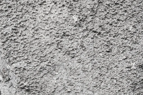 以灰色水泥纹理覆盖的裂缝混凝土灰色墙体为背景,可用于设计. 带有裂缝和孔的肮脏混凝土质感. — 图库照片