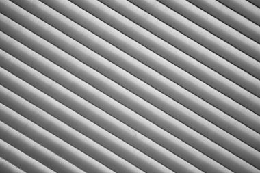 Otomatik Fabrika Kapısı Kapısı Kapısı Kapısı, Depodaki Güvenlik Sistemi için Çelik Kapı. Mimari Metal Erişim Kapısı Atölye Garajının Granit Duvar Arkaplanı.