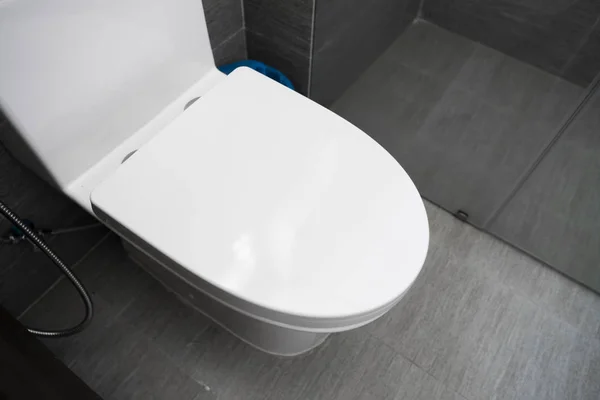 White toilet in modern home. White toilet bowl in bathroom. — ストック写真