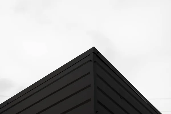 Superficie de textura de lámina de metal corrugado negro de la pared. Galvanizar fondo de acero . — Foto de Stock