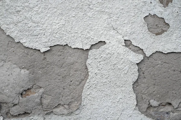 Arka planda gri çimento dokusu ile kaplı çatlak beton duvar tasarımda kullanılabilir. Çatlak ve delikli kirli beton doku.. — Stok fotoğraf