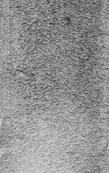 Тріснута бетонна сіра стіна, покрита сірою цементною текстурою, як фон може бути використана в дизайні. Брудна бетонна текстура з тріщинами і отворами . — стокове фото