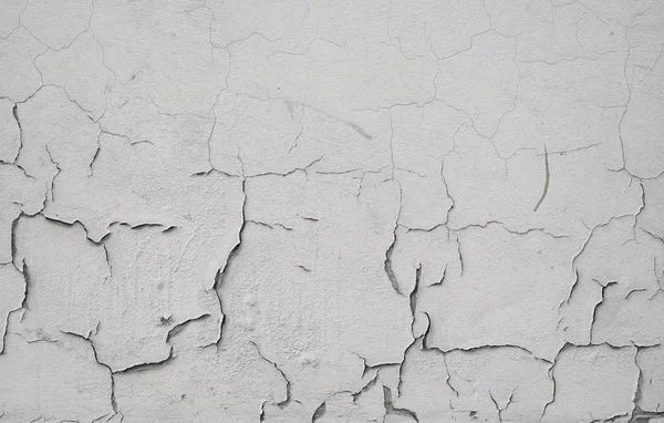 Arka planda gri çimento dokusu ile kaplı çatlak beton duvar tasarımda kullanılabilir. Çatlak ve delikli kirli beton doku.. — Stok fotoğraf