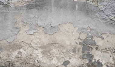 Arka planda gri çimento dokusu ile kaplı çatlak beton duvar tasarımda kullanılabilir. Çatlak ve delikli kirli beton doku..