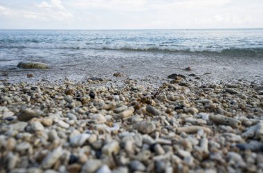 Close up of rounded and polished beach rocks. Pebble stones at the sea, Colorful Pebble Stones.
