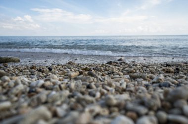 Close up of rounded and polished beach rocks. Pebble stones at the sea, Colorful Pebble Stones.