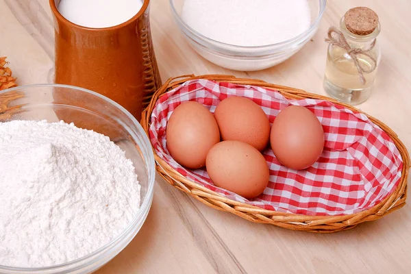 Wicker Basket Eggs Heap Flour Glass Milk Sugar Butter White — Stock Photo, Image