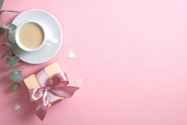 Romantic woman's desk with coffee cup, gift box and heart on pink background. Happy Women's, Mother's, Valentine's Day, birthday greeting card design — 스톡 사진