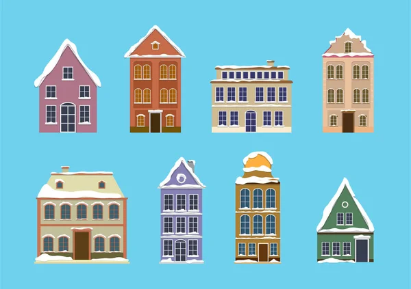 Set van Europese kleurrijke oude huizen met sneeuw. plat ontwerp — Stockvector