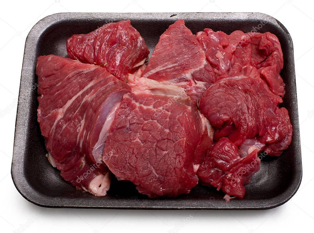 Beef meat in tray isolated on white background