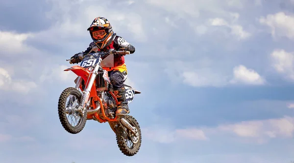 A child at a motocross training session in Moscow at the Technical Sports Stadium 로열티 프리 스톡 사진