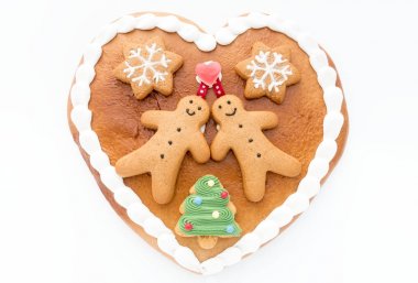 Decorated Gingerbread Heart on White Background clipart