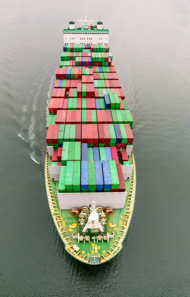 top view of the ship - the container ship sails in the ocean alo