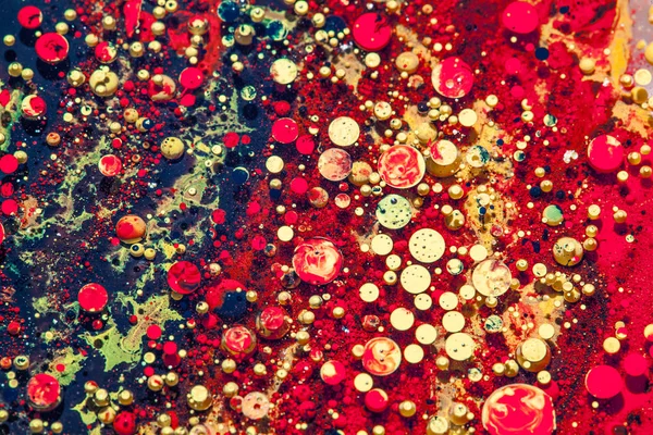 赤と金色の油とインクの泡を削除マクロの背景 — ストック写真