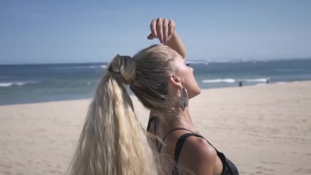 Young Woman Black Shine Dress Standing Beach Rising Hands View — 비디오