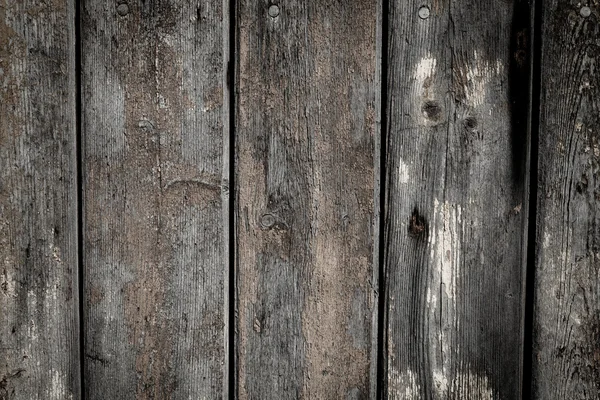 Holzhintergrund mit verwittertem Holz und rostigen Nägeln — Stockfoto