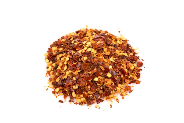 Högen av en krossad röd paprika — Stockfoto