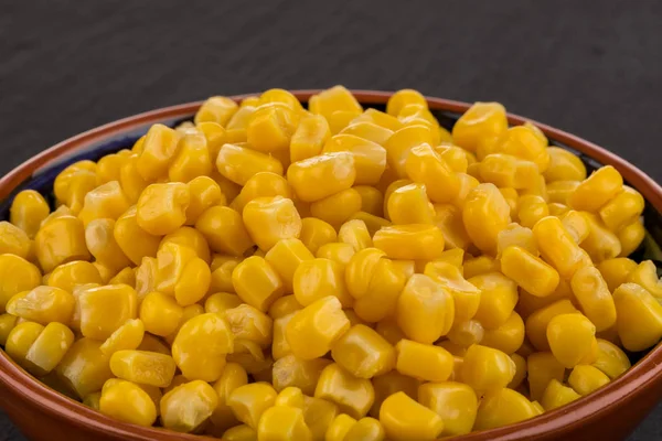 Sweet canned corn in bowl — Stock Photo, Image