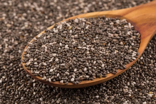 Chia seeds in wooden spoon — Stock Photo, Image