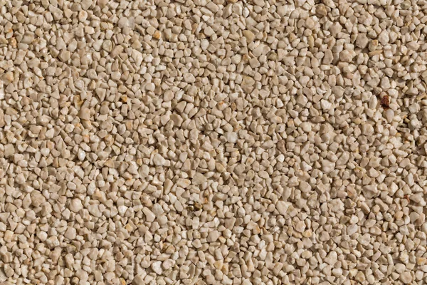 Pequeñas piedras textura de pared — Foto de Stock