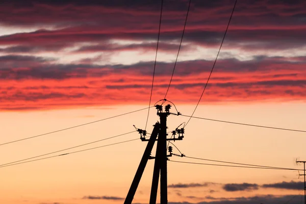 Elektrisk Kraftledning Mot Färgglad Himmel Vid Solnedgången — Stockfoto