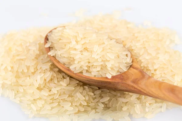 Rice in spoon — Stock Photo, Image