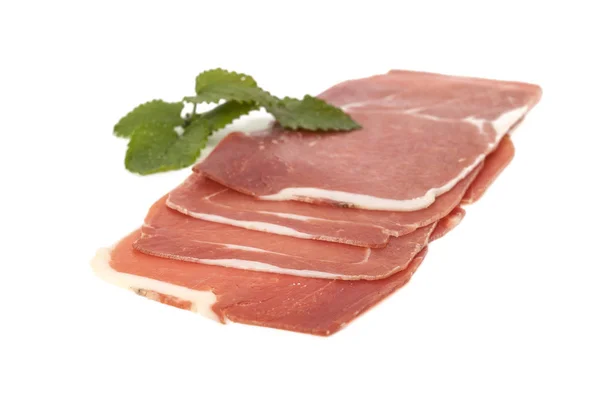 Closeup on a piece of spanish serrano ham — Stock Photo, Image