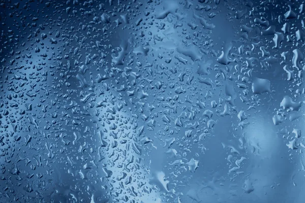 Gotas de lluvia sobre vidrio — Foto de Stock