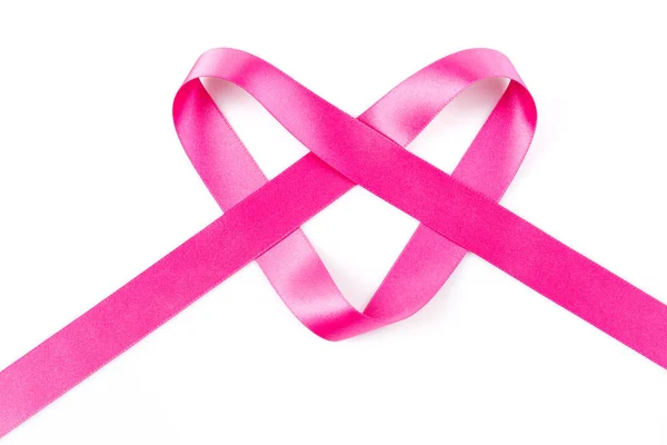 Pink ribbon in the shape of a heart — Stock Photo, Image