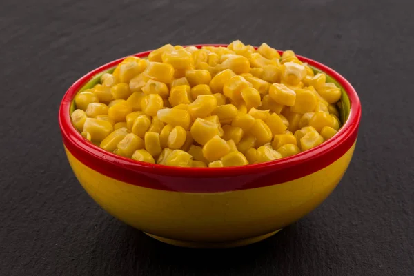 Sweet canned corn in bowl — Stock Photo, Image